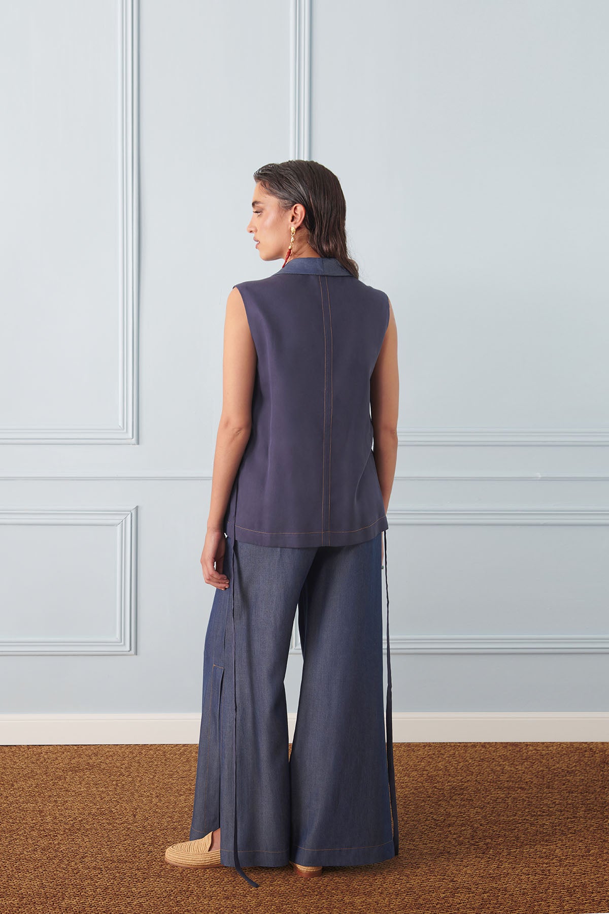 Pantalone con spacco